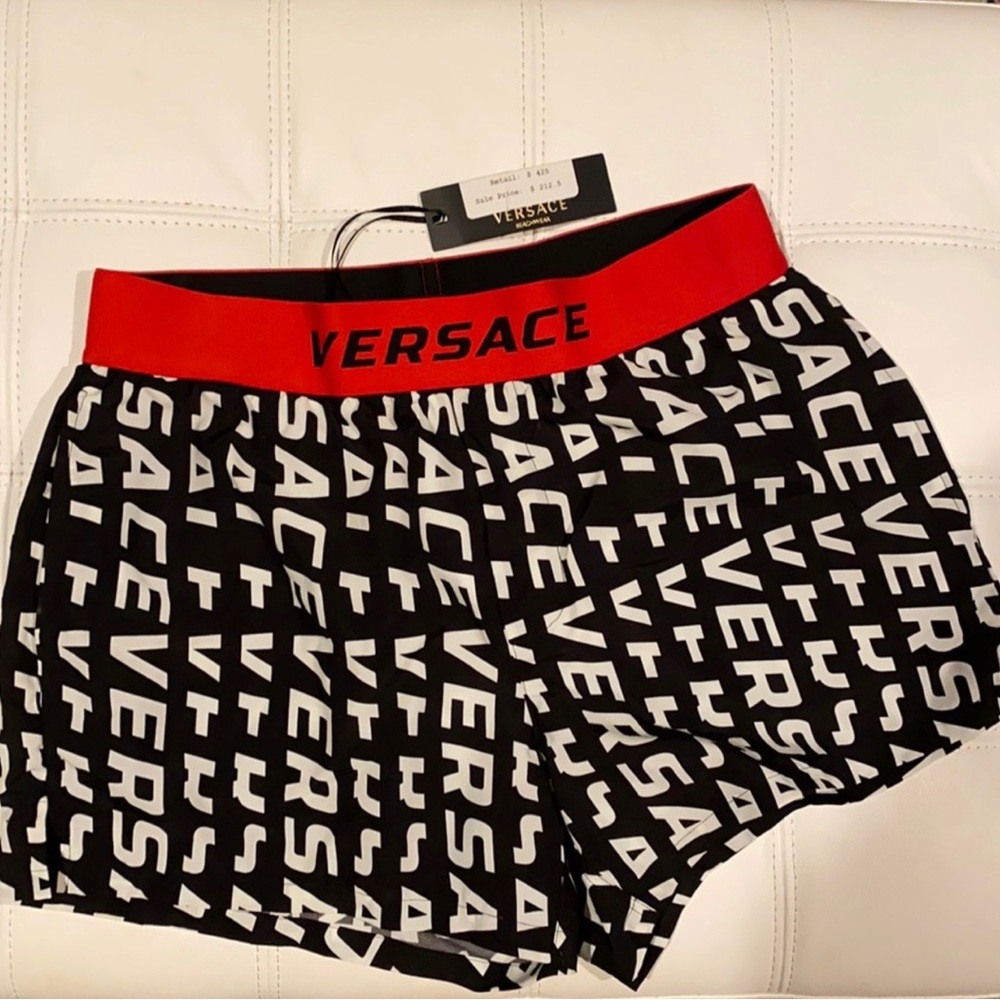 Versace bathing suit, size 4 , us 32, new with tags, %100 authentic
